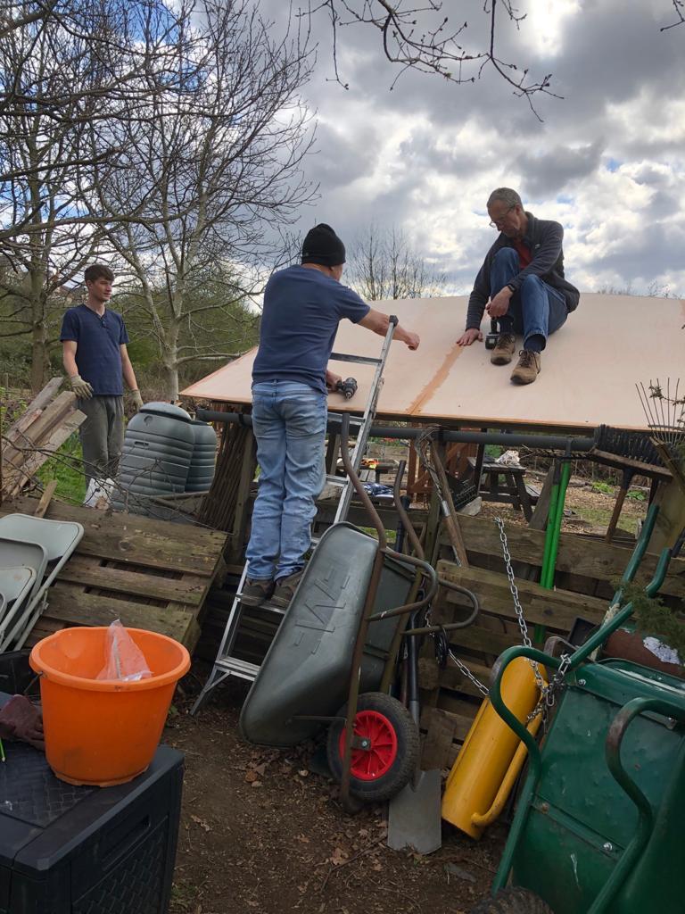 New rain water capture roof being installed by Richard, Paul and Callum