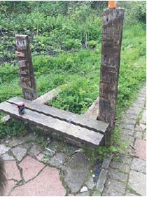 Vandalised bench in Liquorice Park